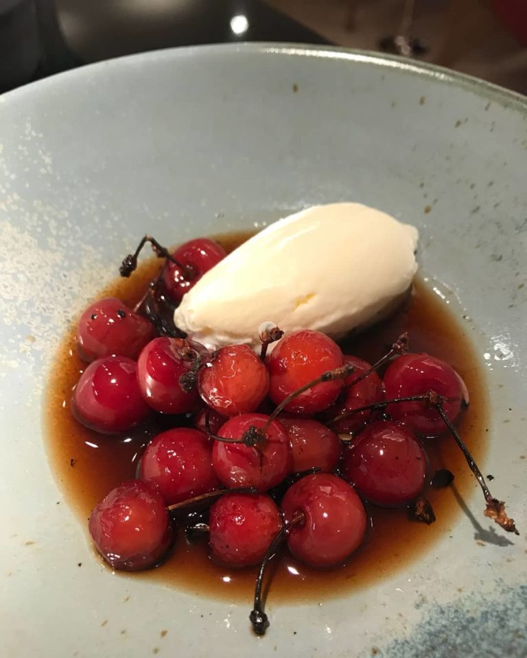 Organic cherries from @brambletyefruitfarm, grilled and smoked with cherry wood, creme fraiche ice cream