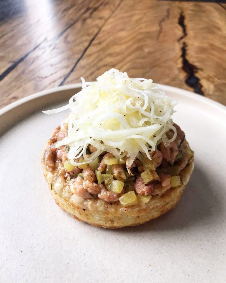 Our crumpets are made fresh every morning and topped with potted shrimps, gherkins, kohlrabi and parsley.